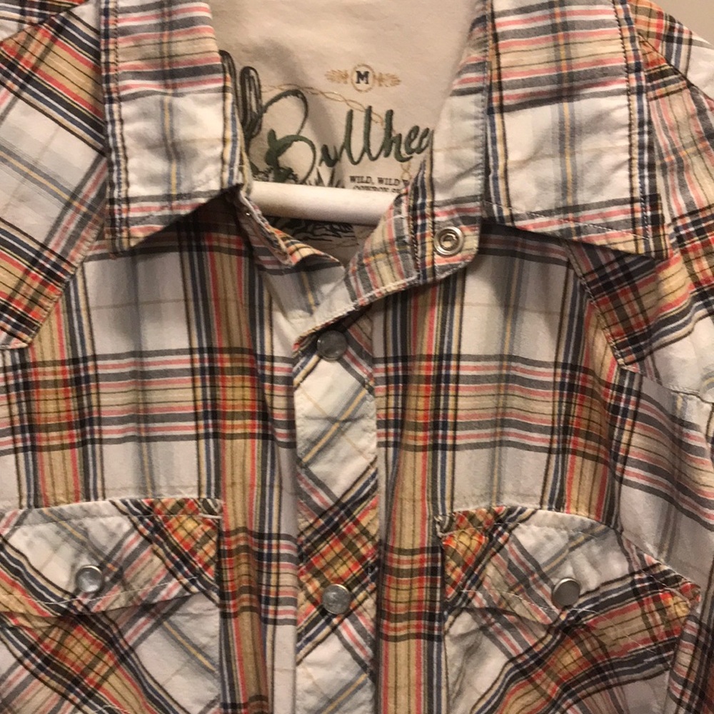 Bullhead cowboy pearl button up; slightly worn.